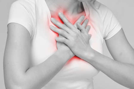 Concept of a person having difficulty breathing chest pressure.の写真素材