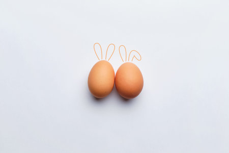 Two abstract rabbits in the form of eggs. Happy easter conceptの写真素材