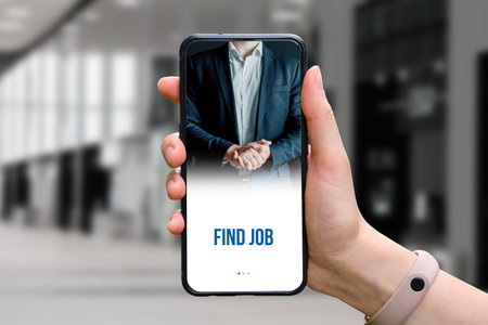 The concept of find job on the phone that keeps a person in the background of a business office.