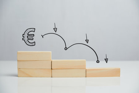 Concept of falling euro sterling currency rate on stairs with downward arrow.の写真素材