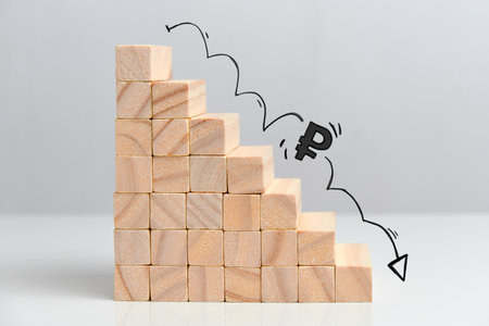 Concept of falling ruble currency rate on stairs with down arrow.の写真素材