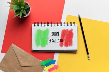 Italian Holiday buon ferragosto drawn on a notebook.の写真素材