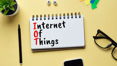 Iot or Internet of things concept. Inscription with a marker in a notebookの写真素材