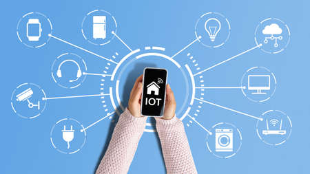 Iot or Internet of things concept. person controls equipment and security through the application on smartphone.の写真素材