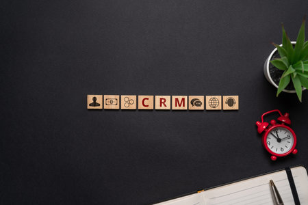 Concept CRM or Customer Relationship Management. Icons with cubes on the table.