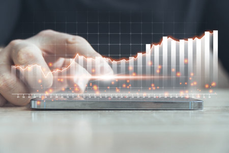 The concept of growth of various indicators in business. The person points to the hologram of the...
