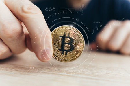 A person holds an abstract cryptocurrency coin. Concept of virtual money.