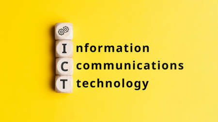 Acronym ICT or Information and communications technology. Text on cubes.の写真素材