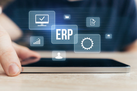 Concept ERP or Enterprise Resource Planning. Business acronym. Holographic display with icons over smartphone.の写真素材