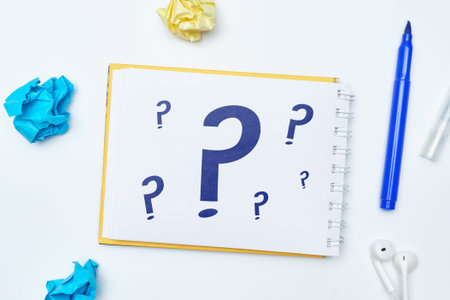 Question mark concept or FAQ. Sign in notepad.