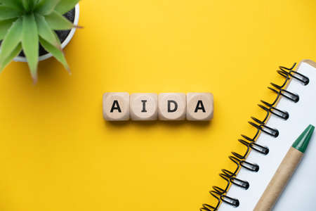 Concept business marketing acronym AIDA or Attention, Interest, Desire, Actionの写真素材