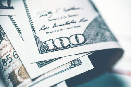 Money and business concept. Paper American dollars in the amount of one hundredの写真素材