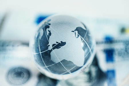 Concept of globalization and world economy. Abstract earth planet ball on money