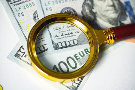 The concept of research and search for investments and capitals. business market. Magnifying glass...