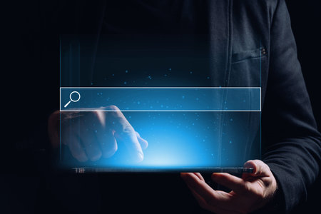 Holographic display with a search bar above the tablet in the hands of a person