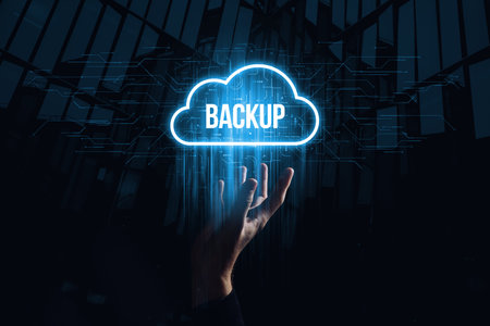 Data backup for data recovery to original or new location. Hologram in the form of a cloud over the...
