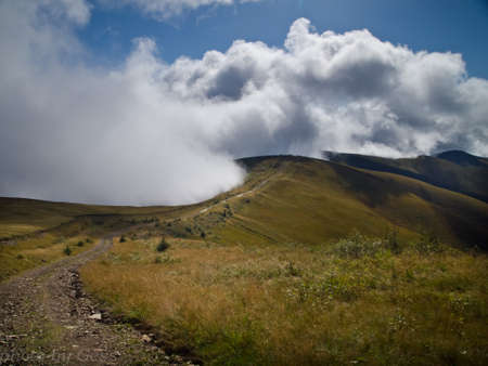 mountain peak. mountain landscape. Spring in the mountains. mountain valley. mountain clouds. morning fogの写真素材