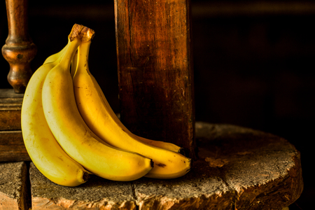 Banana on a rustic stoneの写真素材