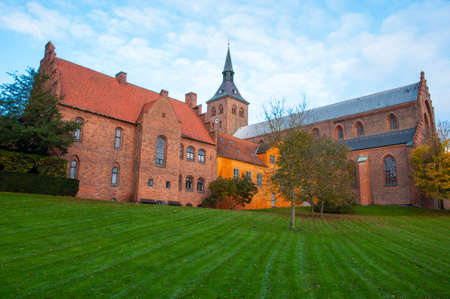 St. Canute's Cathedral in city of Odense in Denmark on a autumn dayの写真素材