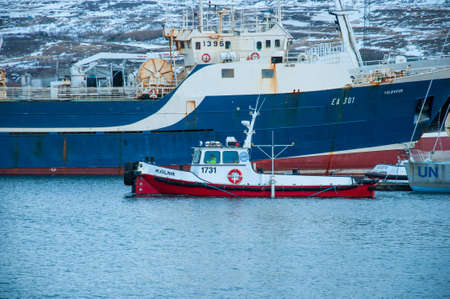 Akureyri Iceland - December 22 2017: Tug boat Mjolnir in port of Akureyriのeditorial素材