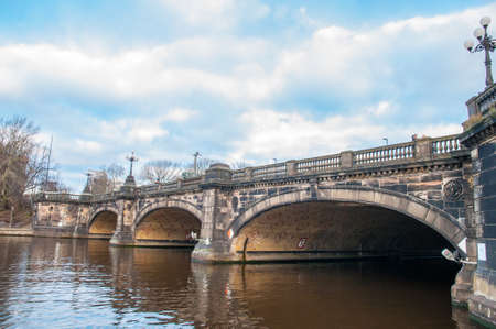 Bridge crossing the Alster lakes in city of Hamburg in Germanyの写真素材