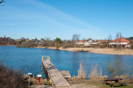 A wooden pier in town of Nyraad in Denmarkの写真素材