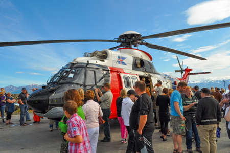 Dalvik Iceland - August 7. 2010: People looking at Icelandic coastguard helicopter TF-LIF