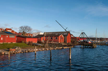 red buildings at Vordingborg harbor in Denmarkの写真素材