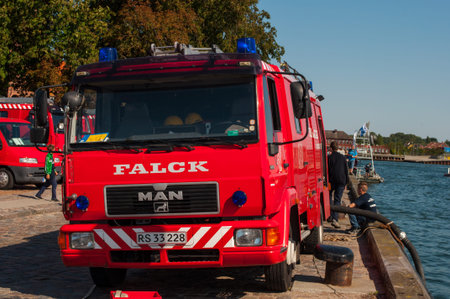 Korsor Denmark - August 22. 2015: MAN firetruck from Falck at the pier