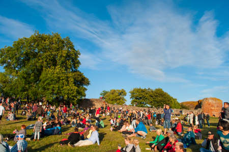 Vordingborg Denmark - June 23. 2014: people enjoying a concert and bonfire at Vordingborg castle ruinsのeditorial素材