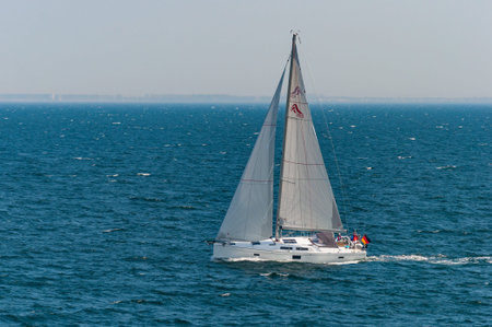 Rostock Germany - May 6. 2016: German sailboat leaving city of Rostock