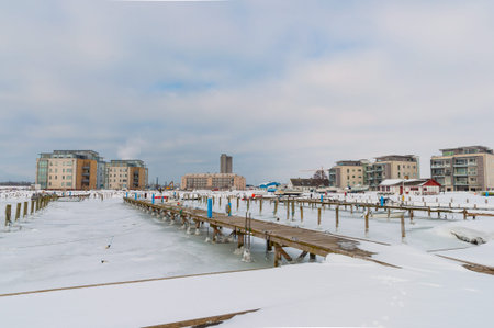 Winter with snow and ice in Vordingborg yacht harbor in Denmarkの写真素材