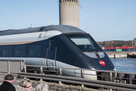Vordingborg Denmark - April 6. 2018: A DSB IC4 train passing the Masnedsund bridge in Denmark