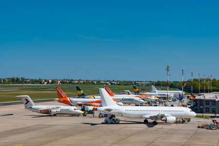 Berlin Germany - April 21. 2018: Airplanes at the Terminal at Berlin Tegel airportのeditorial素材