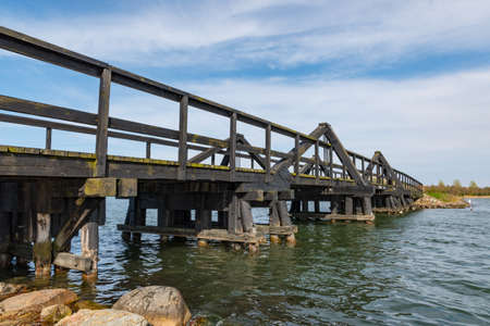 bridge towards island of Langoe in Denmarkの写真素材
