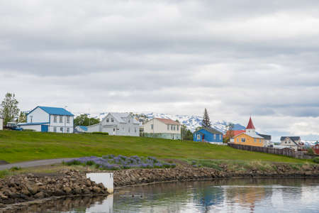 Village of Hrisey in Iceland on an overcast summer dayの写真素材