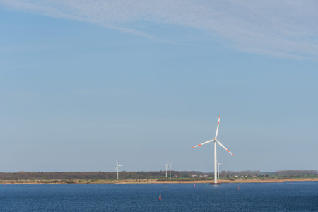 Windmills in the German landscape near city of Rostockの写真素材