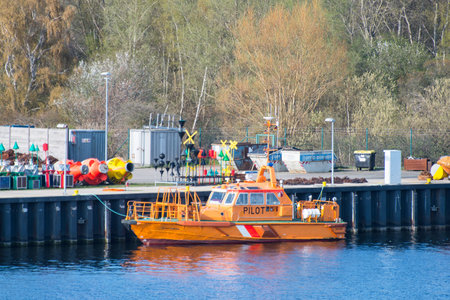 Rostock Germany - April 22. 2018: Orange pilot boat in city of Rostock in Germanyのeditorial素材