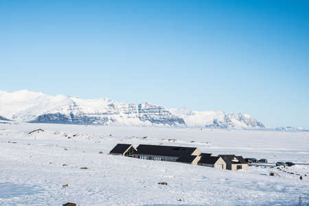 Service buildings at Fjallsarlon glacier lagoon in south Iceland on a sunny winter dayの写真素材