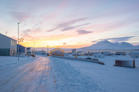 Sun is shining in the south during winter solstice seen from island of Hrisey
