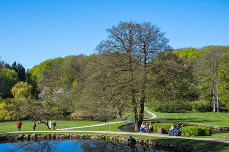 Liselund Denmark - May 5. 2018: people walking in the park at Liselund palace in denmark on a sunny spring dayのeditorial素材