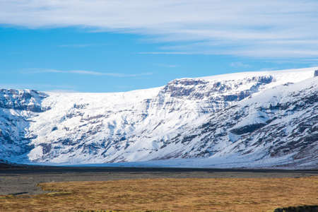 Valley of Kalfafellsdalur in Iceland with Vatnajokull glacier in the backgroundの写真素材