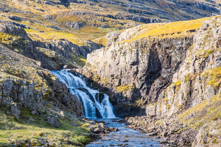 Waterfall in river fjardara in Seydisfjordur in east Icelandの写真素材