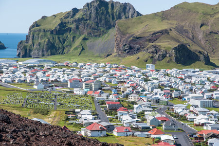 View over town of Heimaey in Iceland on a sunny summer day