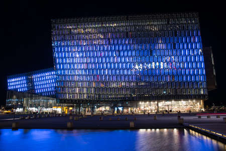 Reykjavik Iceland - October 26. 2018: Concert hal Harpa in the evening with blue lightのeditorial素材