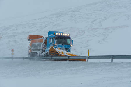 Skjoldolfsstadir Iceland - February 9. 2019: A Lorry with a snowplow plowing snow in Jokuldalur in East Icelandのeditorial素材
