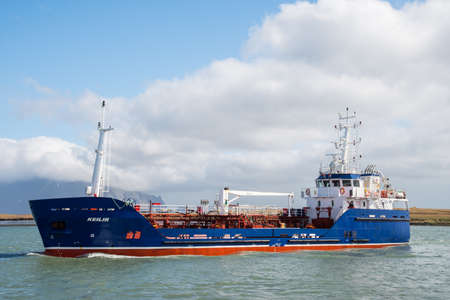 Hornafjordur Iceland - April 27. 2019: Oil tanker Keilir entering port of Hornafjordur in south Icelandのeditorial素材
