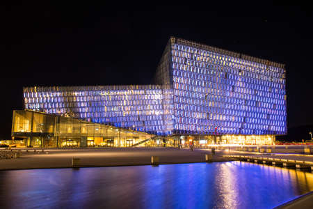 Reykjavik Iceland - October 26. 2018: Concert hal Harpa in the evening with blue lightのeditorial素材