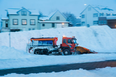 Hofn Iceland - February 4. 2019: snowplow cleaning the road in town of Hofn in South Icelandのeditorial素材
