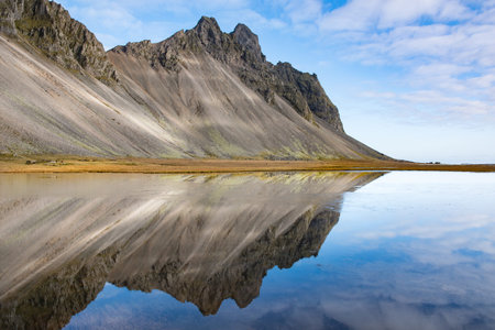 Vestrahorn mountain in southeast Iceland on a sunny autumn dayの写真素材